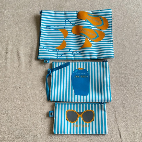 Set of Tommy Hilfiger/Shiseido Aquamarine Beach Tote with 3 Accessory Bags - Picture 10 of 13